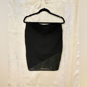 Black pencil skirt size XL. Worn a few times and it's in good condition